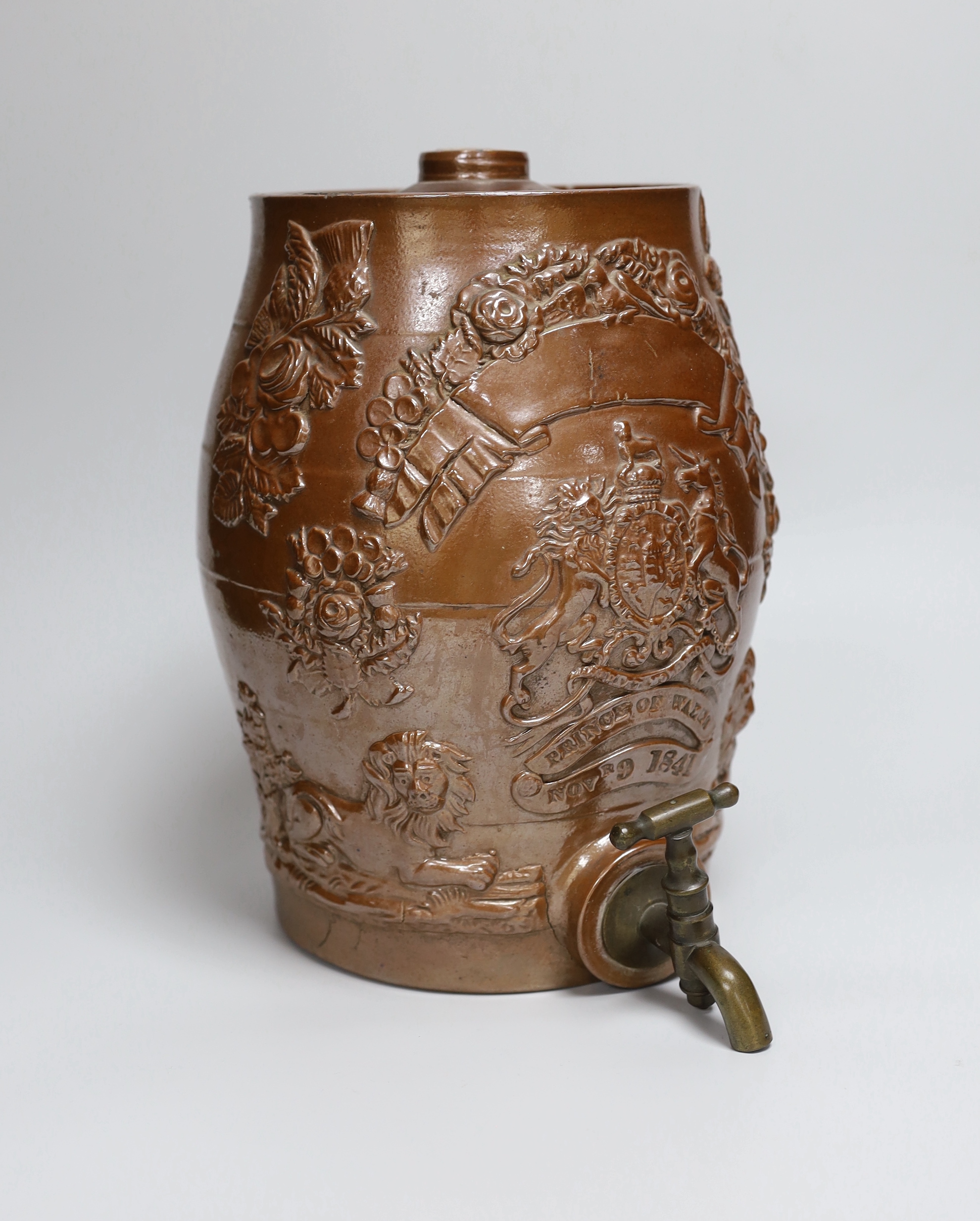A mid 19th century Brampton brown salt glazed stoneware two gallon spirit barrel, moulded with the arms of the Prince of Wales and his birthday, November 9th 1841, fitted with a brass spigot, 28cm